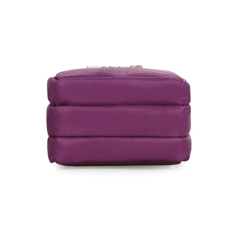 Mobile phone bag crossbody mini bag in purple with quilted padding by Simples Market