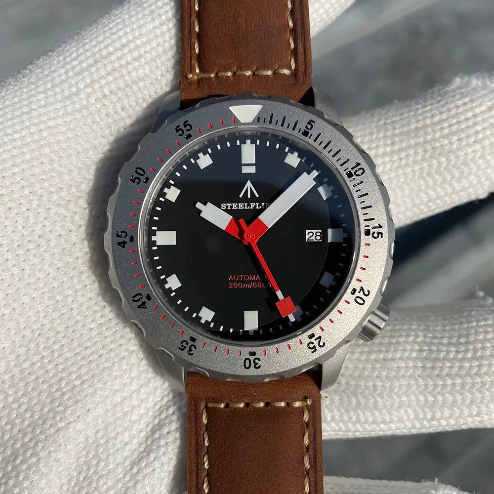STEELFLIER SF752 diver watch with black dial, steel case, red hands, date, 200m water resistant, leather strap
