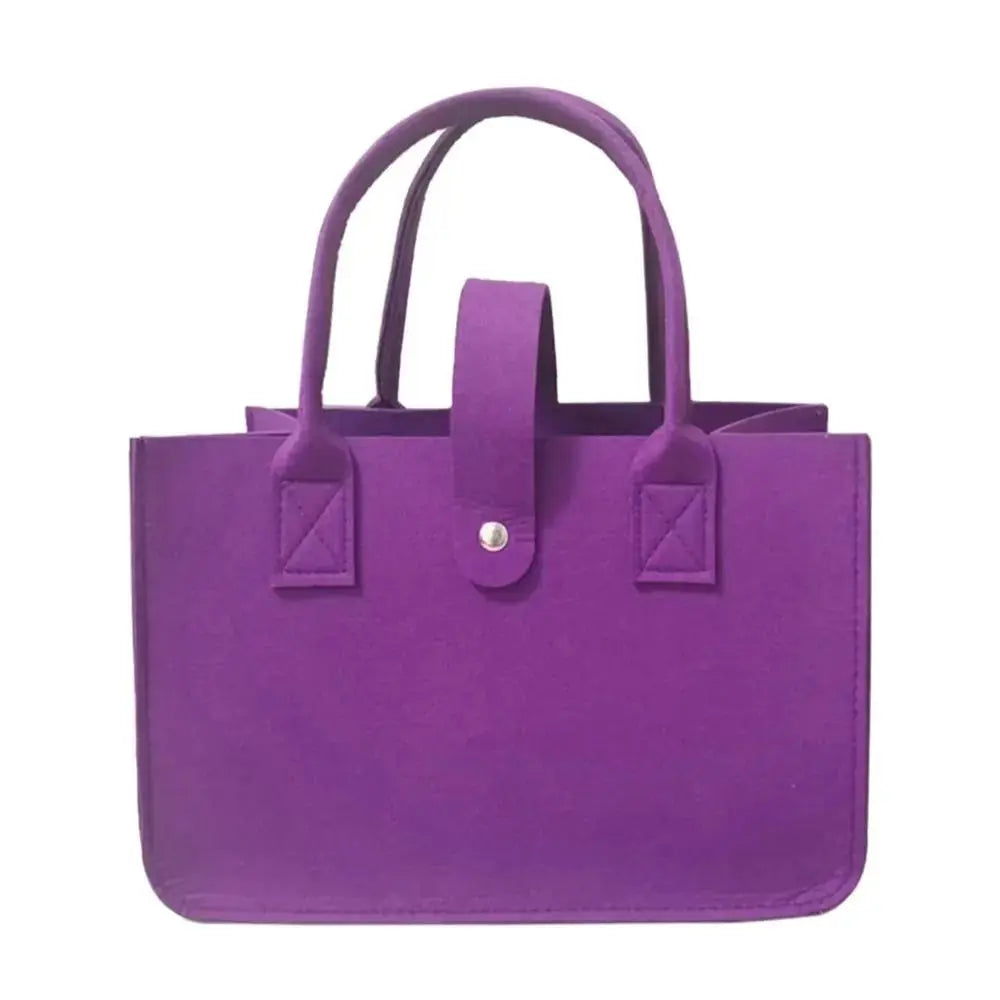 Portable large-capacity purple mummy bag with felt material, two handles and front strap closure by Simples Market
