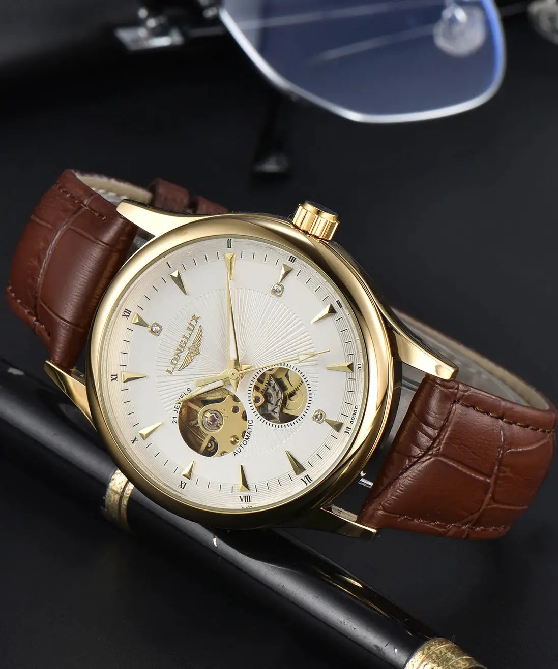 LONGLUX automatic wristwatch with gold-tone case and brown leather strap