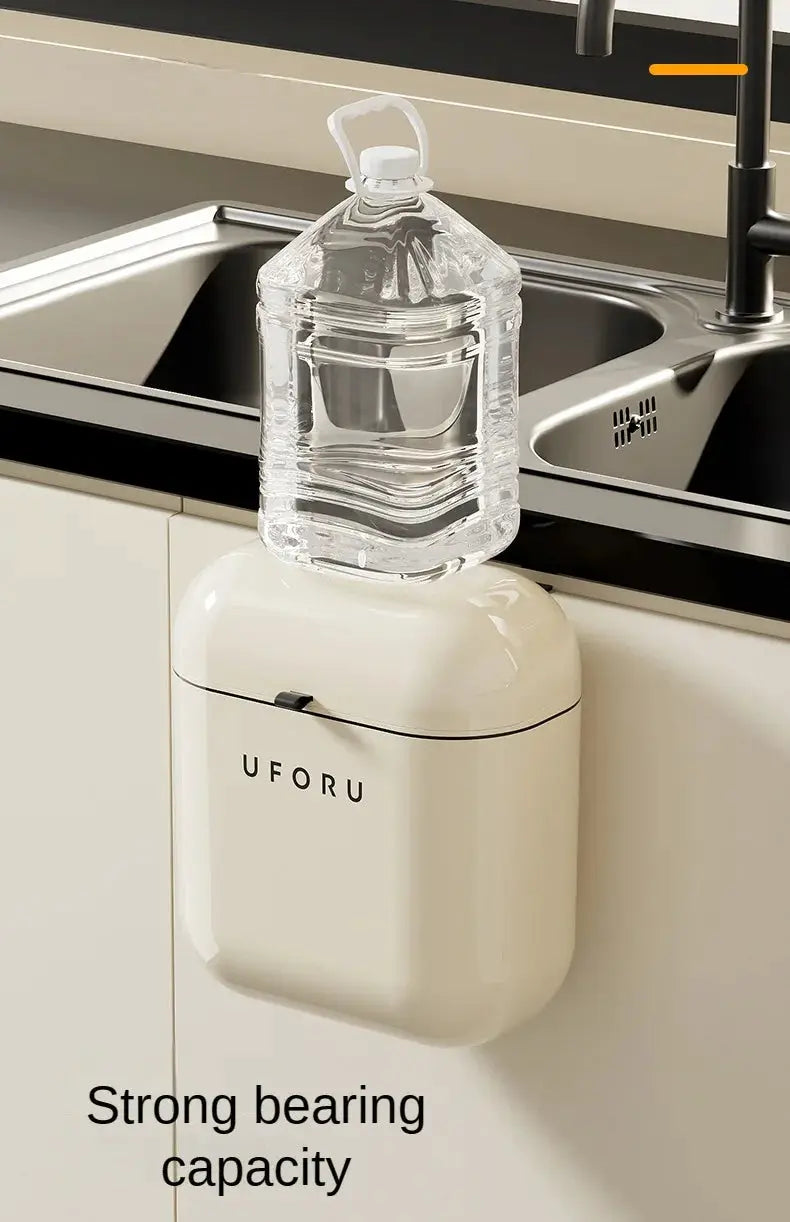 UFORU cream wall-mounted trash can with lid; 9L/12L capacity, shown under kitchen sink.