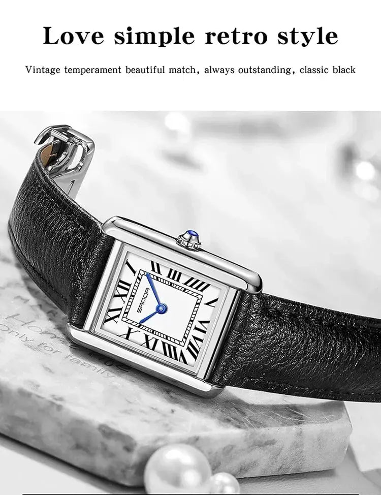 SANDA square luxury quartz watch with black leather strap, silver case, white Roman-numeral dial and blue hands.