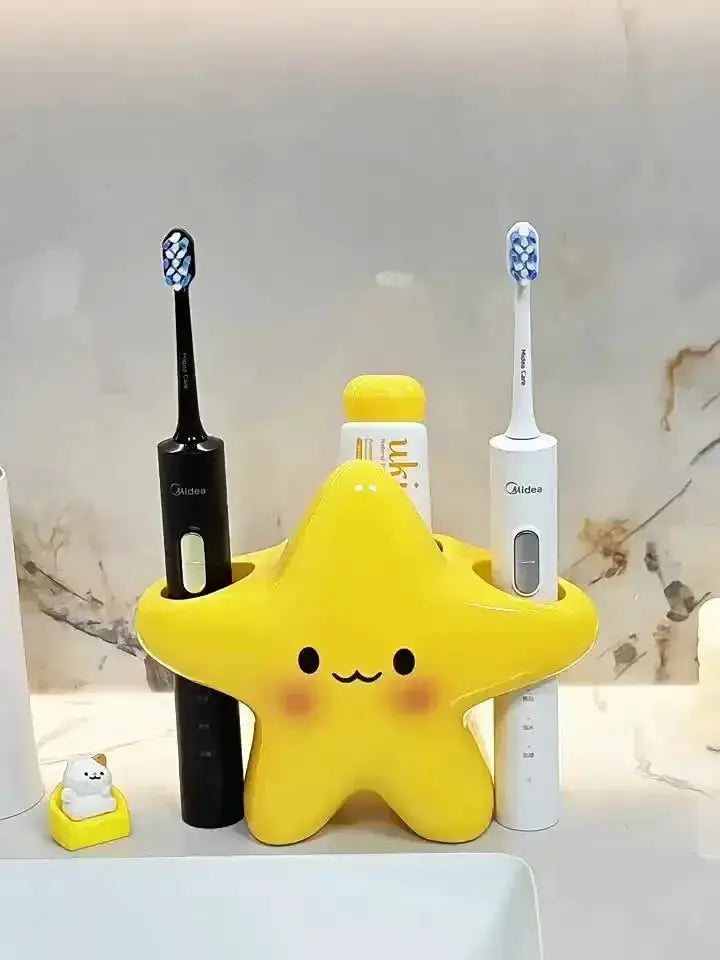 Yellow star-shaped toothbrush holder by Simples Market, freestanding organizer with a cute face, holds 2 toothbrushes