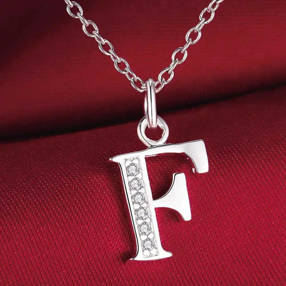 Letter F pendant necklace, 925 sterling silver with zircon stones on a silver chain.