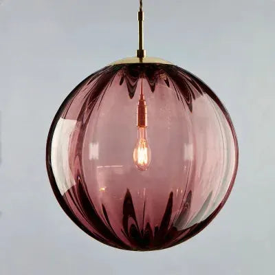 LED pendant light pink glass sphere with brass mount and visible bulb