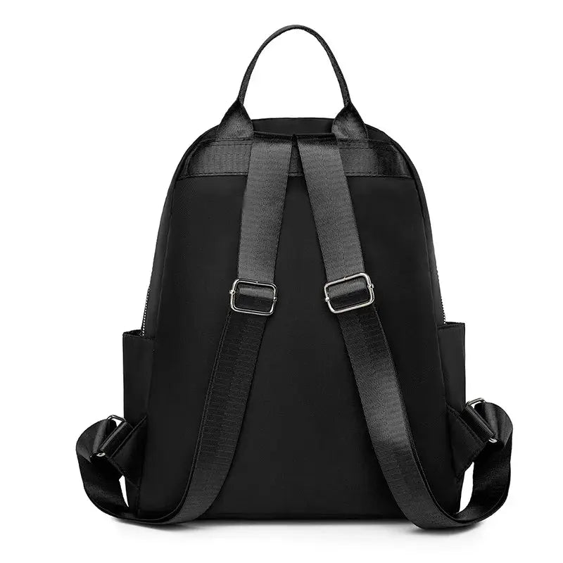 Travel backpack by Simples Market, black, large-capacity with adjustable straps and side pockets