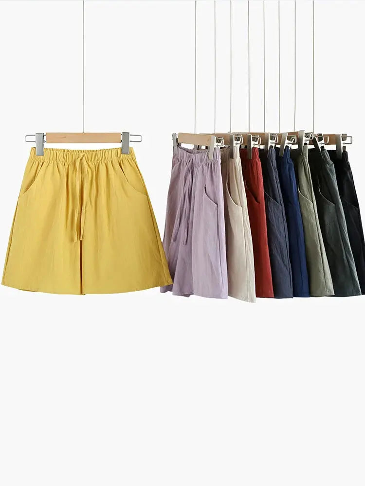 Casual linen shorts for women in yellow with assorted colors; high-waisted gym style.