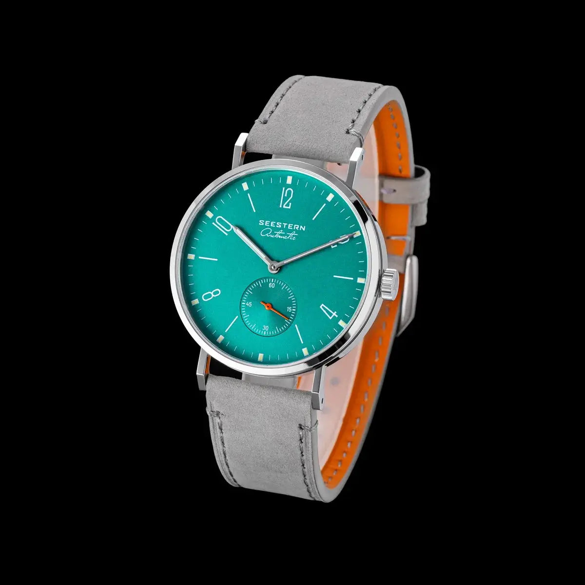 Seestern automatic men's wristwatch with turquoise dial, silver case and grey suede strap with orange underside