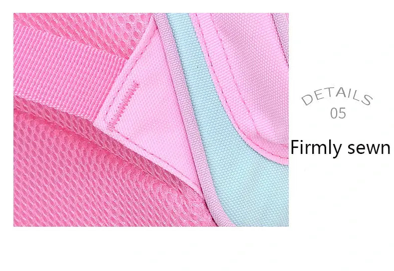 Girls pink backpack with light blue trim; reinforced stitching and breathable mesh padding