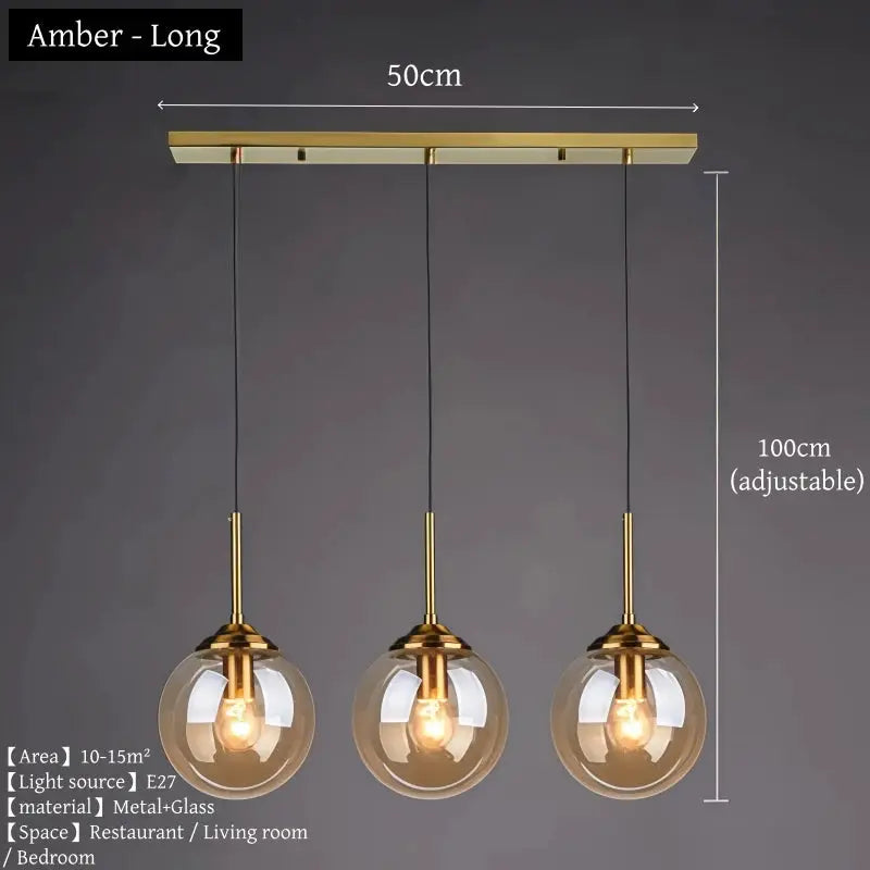 Three-light amber glass pendant chandelier with brass metal finish, 50cm wide, 100cm adjustable hanging length.