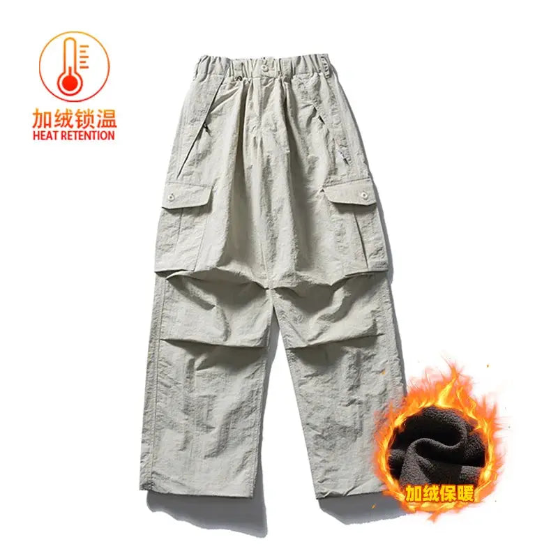 Simples Market ultra loose gray outdoor cargo pants with wide legs and multiple pockets.