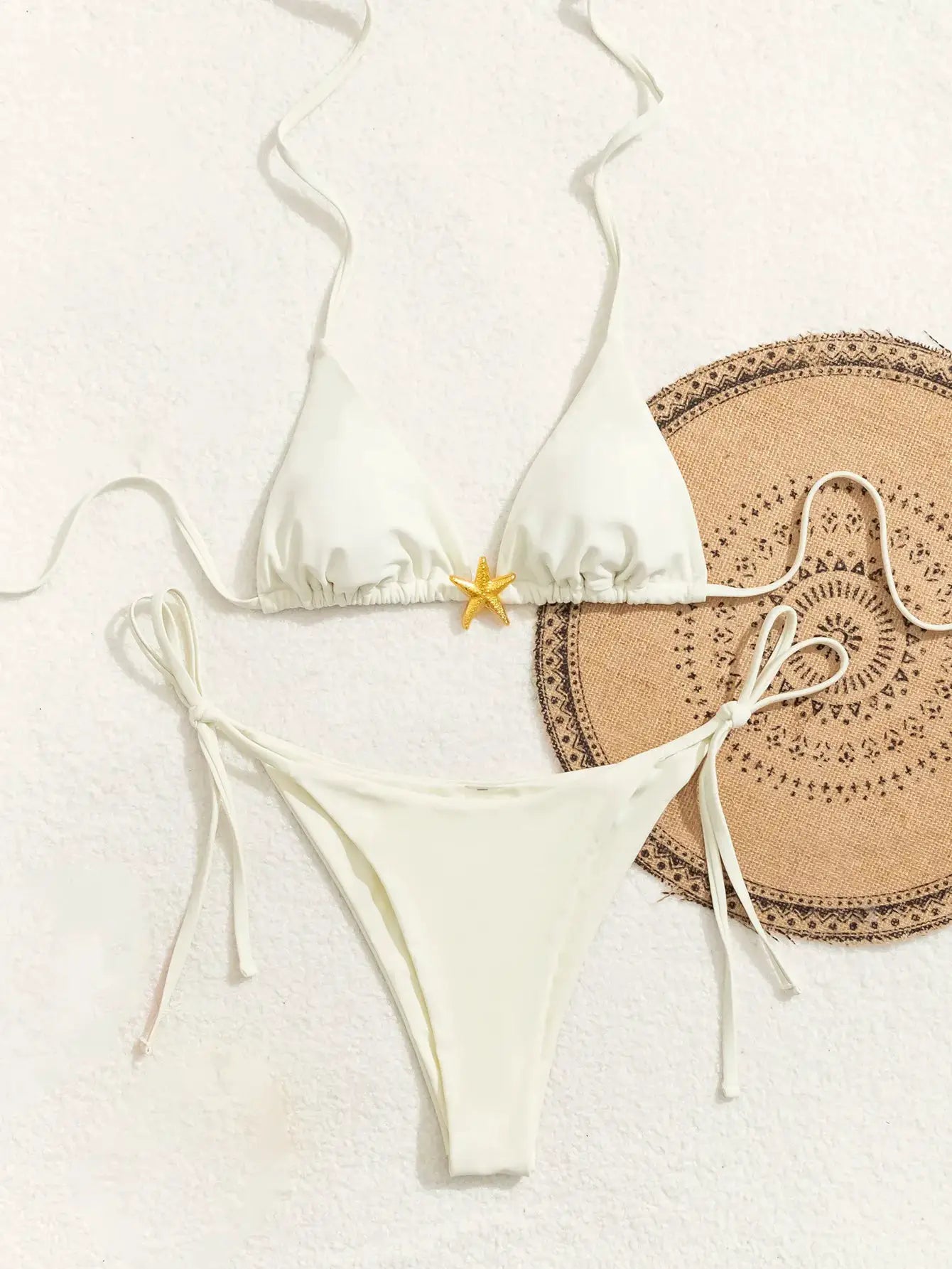Simples Market triangle bikini set in white with string-tie top and Brazilian bottoms; starfish accent