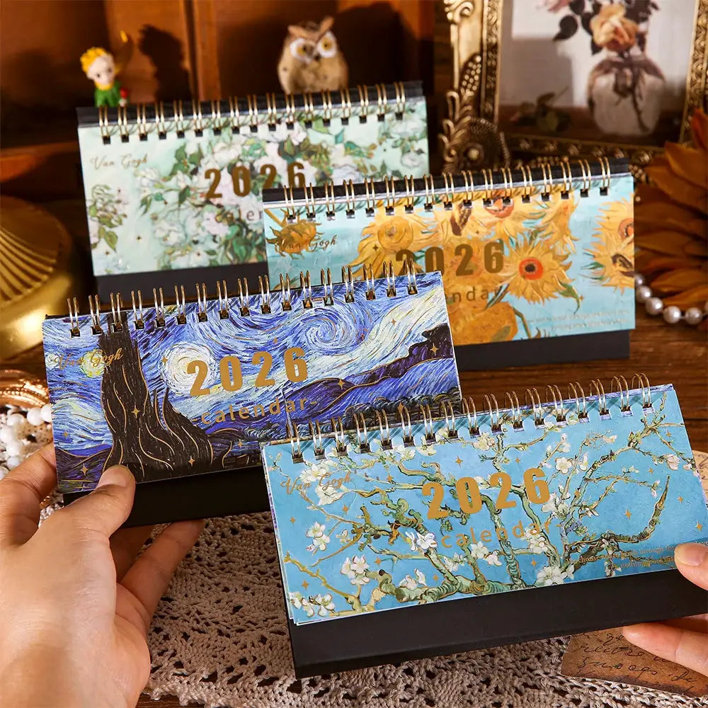 Desk calendar set 2026 with four vintage painting covers on black stands, featuring Starry Night and Sunflowers