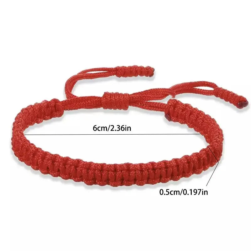 Handmade red braided string bracelet with adjustable knot, 6 cm long.