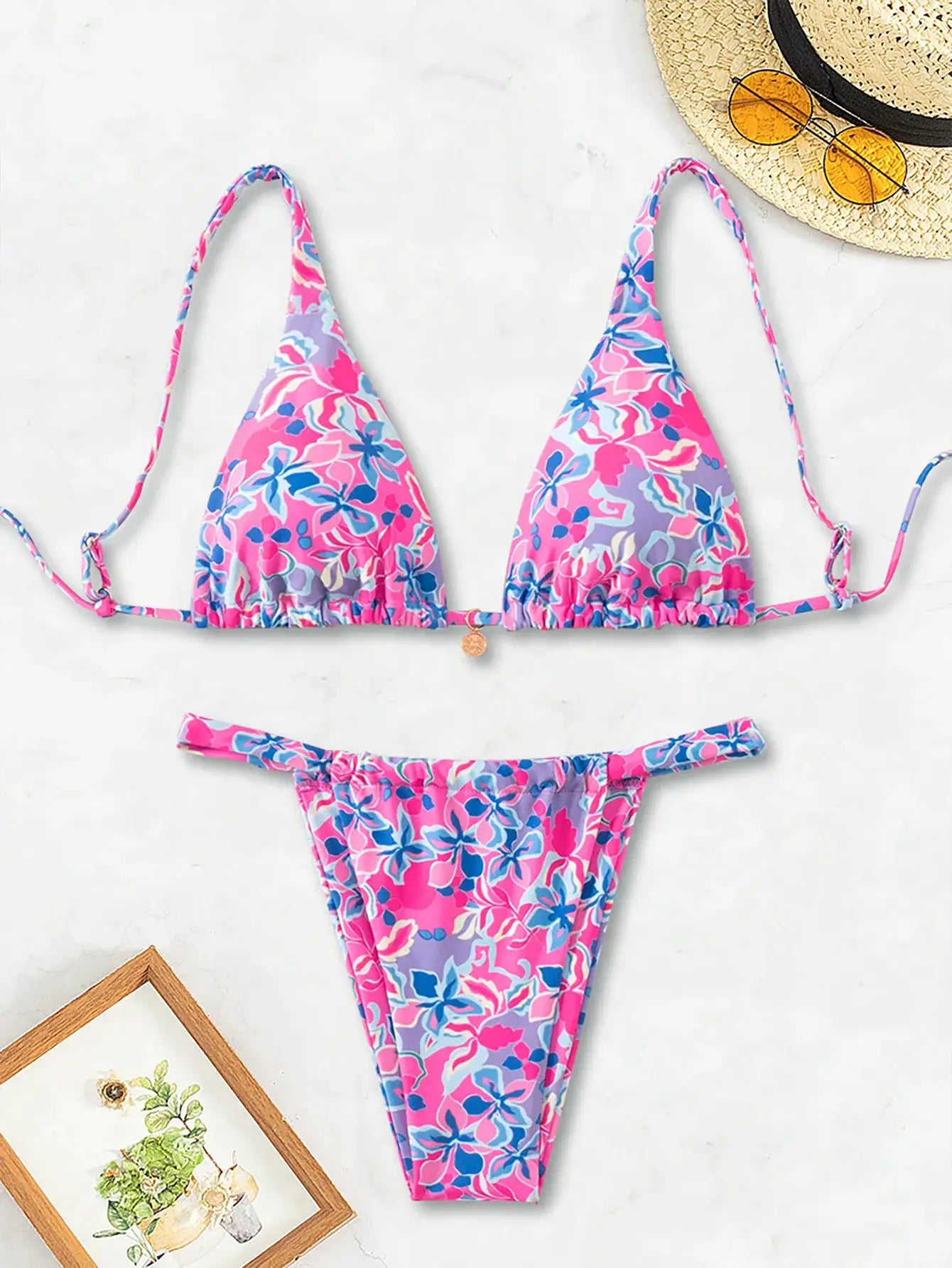 Simples Market 2026 2-piece Triangle Bikini Set: floral pink-purple print, push-up triangle top with Brazilian bottoms.