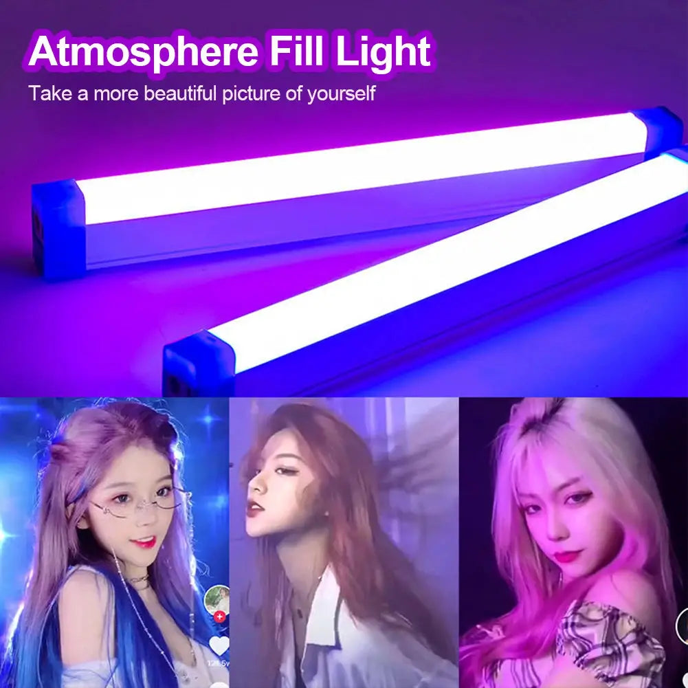 Two Simples Market LED video light wands, rechargeable handheld fill lights for vlogging and live streaming, purple glow.
