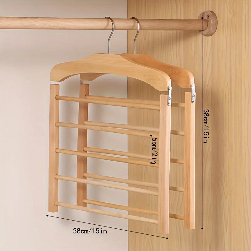 Solid wood multifunctional multi-tier trouser rack, light natural wood finish, wall-mounted organizer by Simples Market.