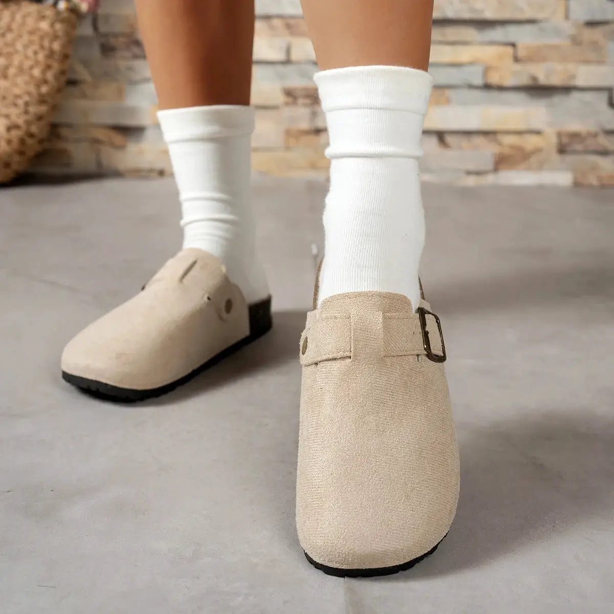 Beige suede women's flat loafers with buckle strap; pair shown