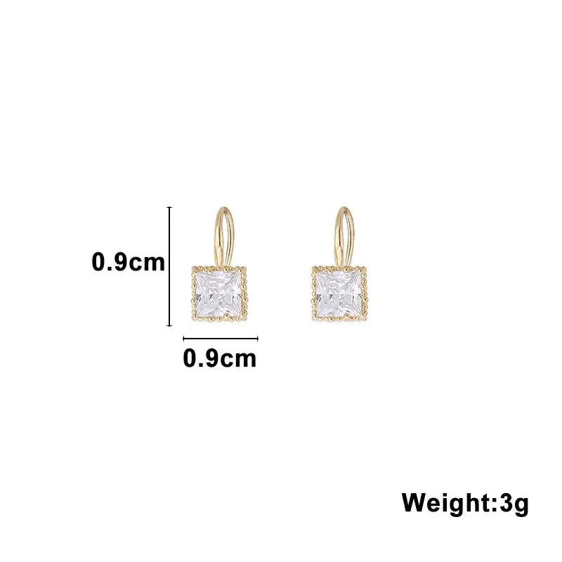 Pair of gold-tone dangle earrings with square clear crystal pendants, 0.9 cm