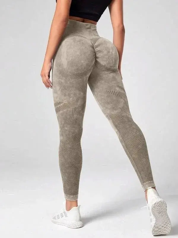 Ladies' seamless high-waist yoga leggings in gray with textured panels and butt-lift fit