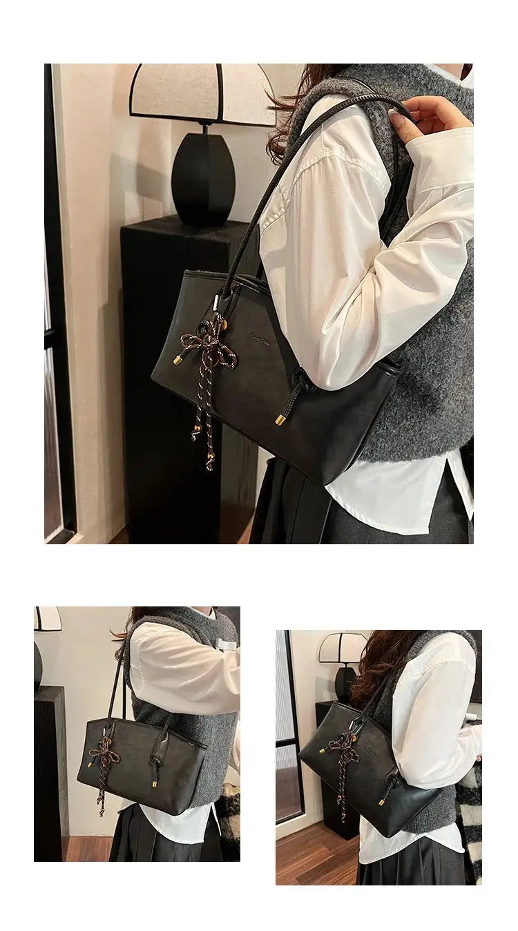 PU Leather Shoulder Bag, black with decorative bow tassel and crossbody strap