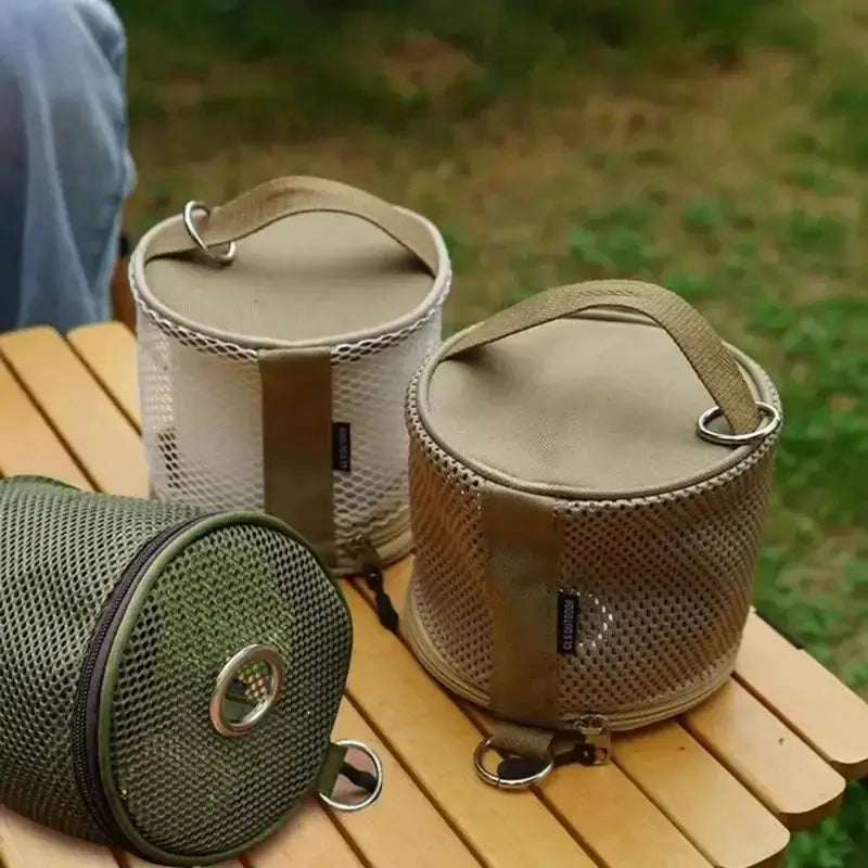 Simples Market camping tissue holder set; three mesh roll cases with handles and hooks in beige and green.