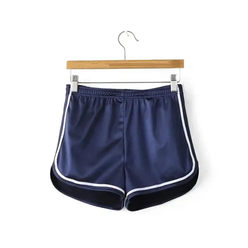 Women's silk navy shorts with white piping and elastic waistband by Simples Market