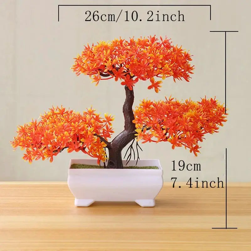 Artificial bonsai tree with orange foliage in a white rectangular pot from Simples Market, about 26 cm wide and 19 cm tall.