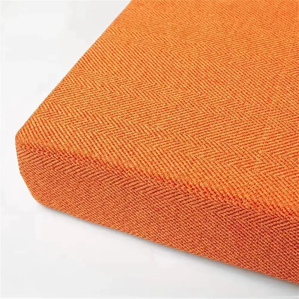 Square chair cushion in orange woven fabric with machine-washable cover by Simples Market