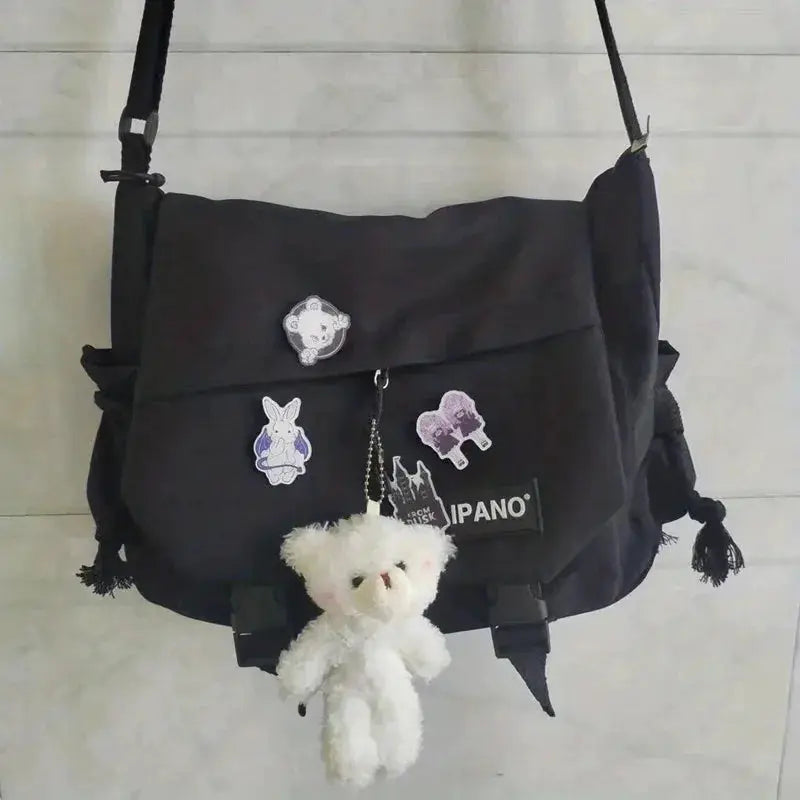Men's nylon crossbody bag, black large-capacity messenger with patch decals and plush teddy keychain