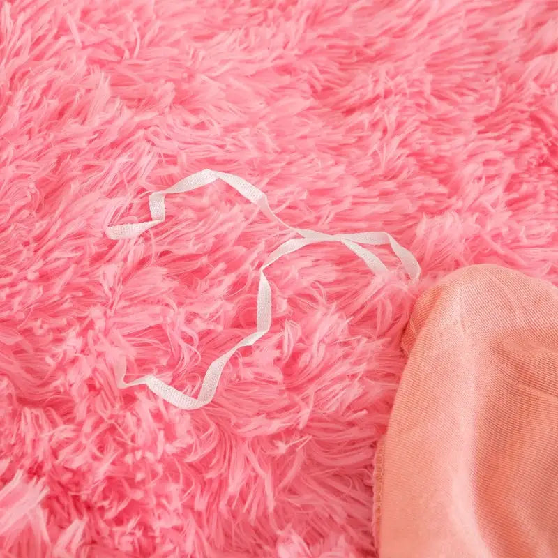 3-Piece Luxurious Plush Duvet Cover Set on bright pink shag bedding with a peach pillowcase accent, ideal for cozy bedrooms.