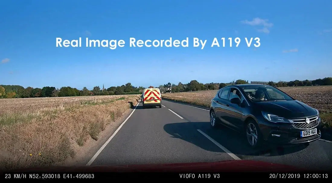 VIOFO A119 V3 dash cam; blue car on the right with a van ahead on a rural road