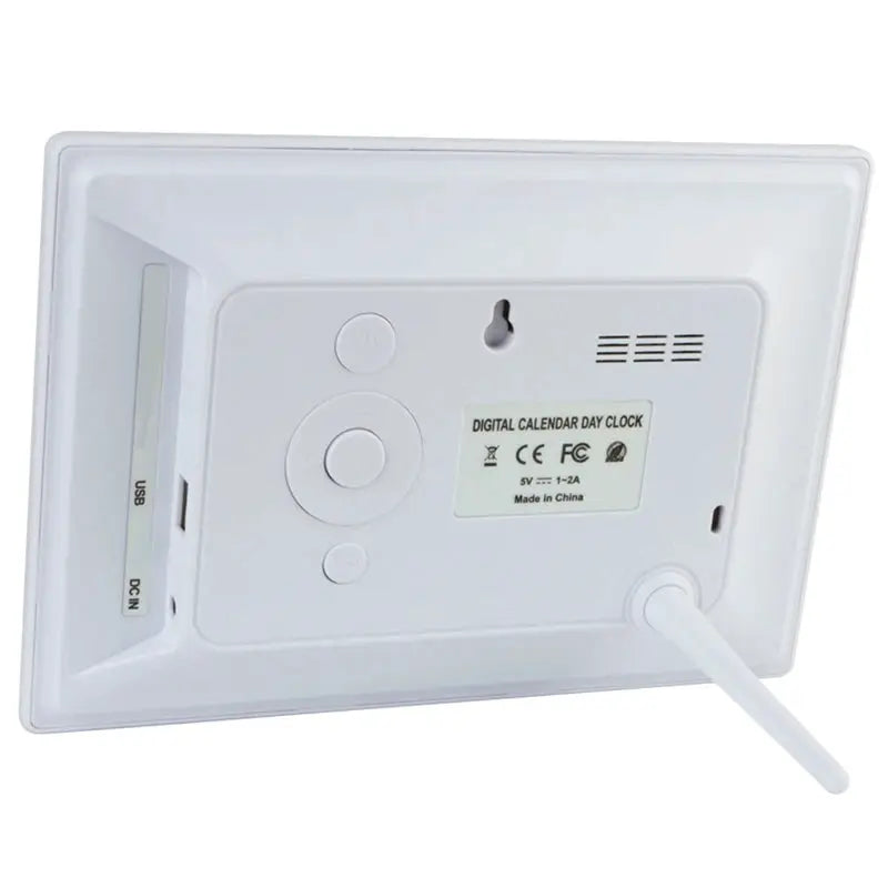 Simples Market 12 Alarms LED Calendar Clock back view; white plastic with USB and DC IN ports.