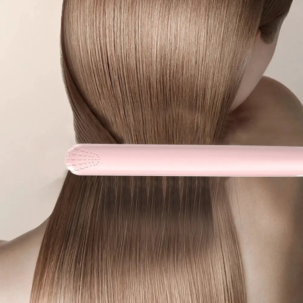 Pink ceramic flat iron hair straightener with floating plates for smooth finish