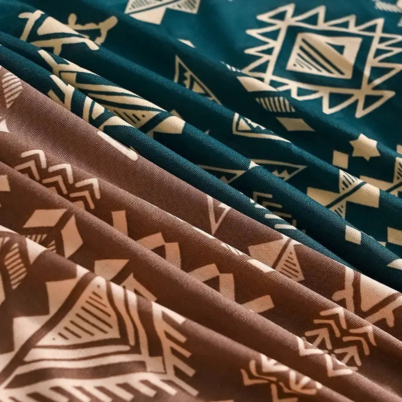 Fabric swatches with geometric tribal prints in teal, brown and beige