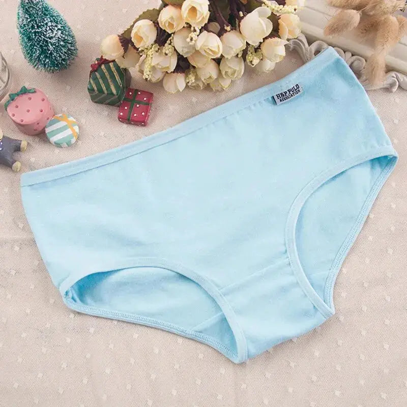 Women's light blue cotton panties, breathable solid-color brief with soft elastic waistband for everyday wear.