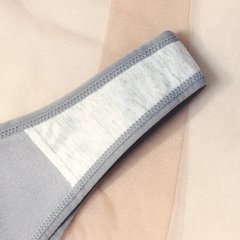 Women's low-waist briefs by Simples Market; light gray fabric with white panel trim