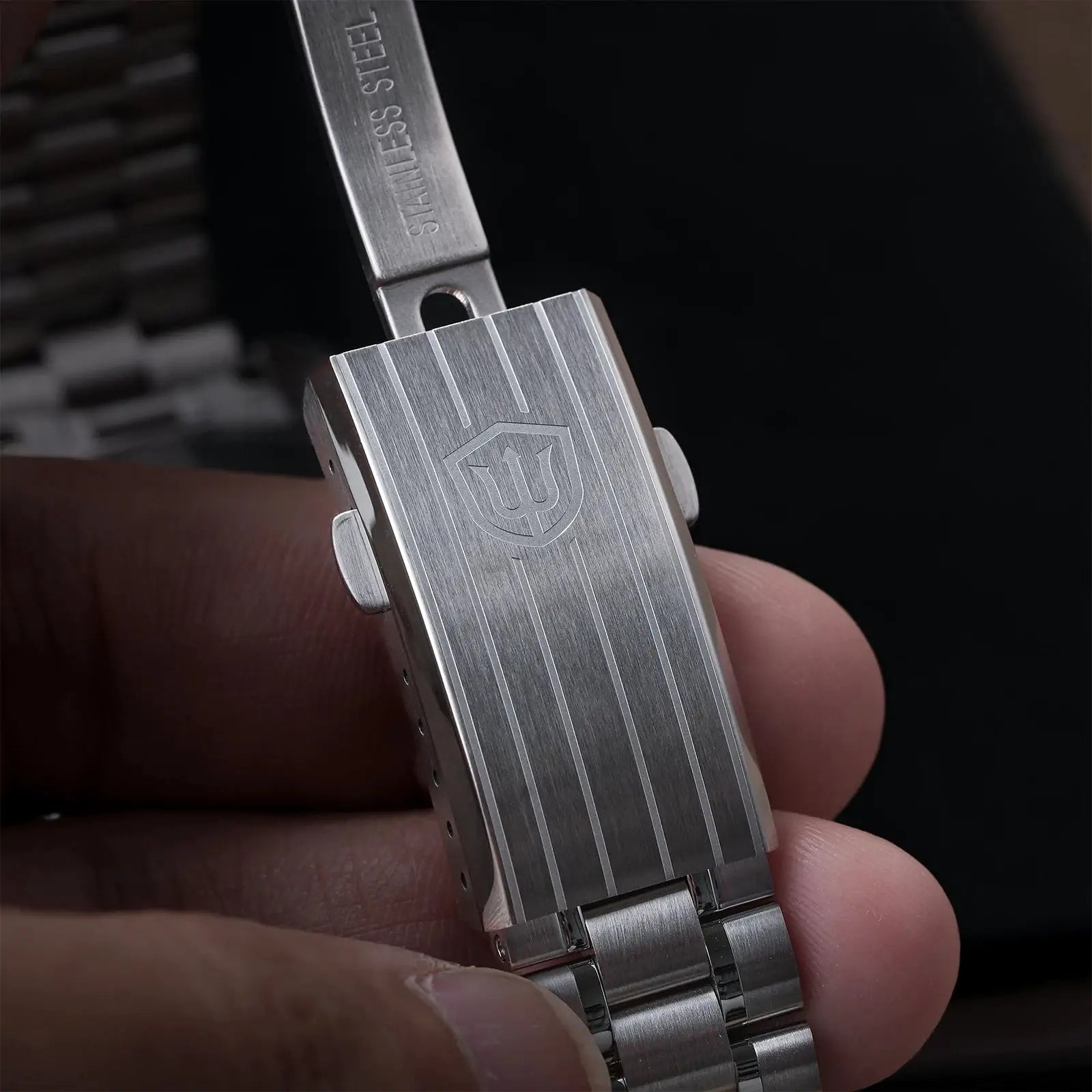 Watchdives WD1863 stainless steel bracelet clasp close-up with brushed finish and shield logo