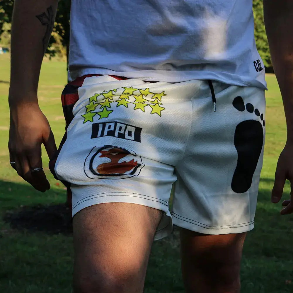 IPPO shorts, white quick-dry training shorts with IPPO logo and star graphic.