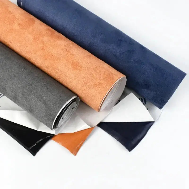 Synthetic leather self-adhesive suede fabric rolls by the meter from Simples Market in blue, tan, gray, black and orange
