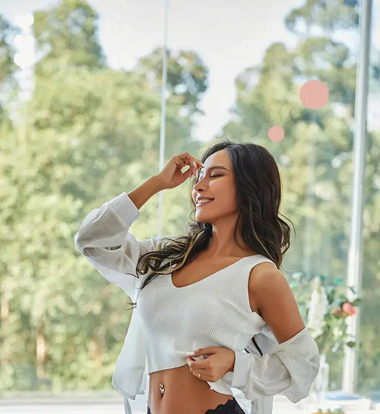 Simples Market 3pc lace lingerie set; white, model posing outdoors in a white crop top