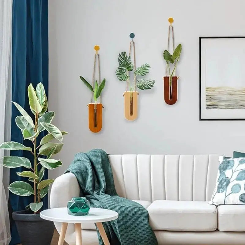 Three Simples Market wooden hanging planters with cords, wall-mounted propagation terrarium vases in natural wood tones