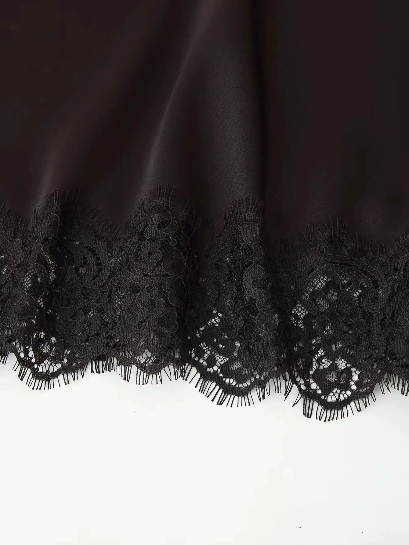 TFMLN satin wrap-around skirt in black with lace trim by Simples Market.
