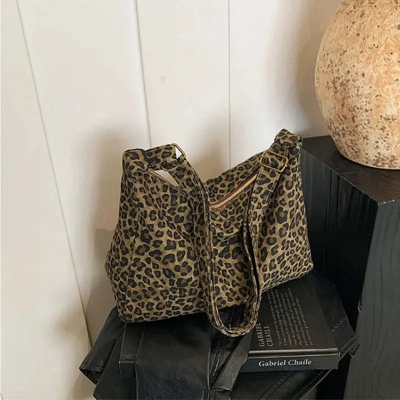 Leopard print women's shoulder bag, soft textile, large capacity crossbody/shoulder style.