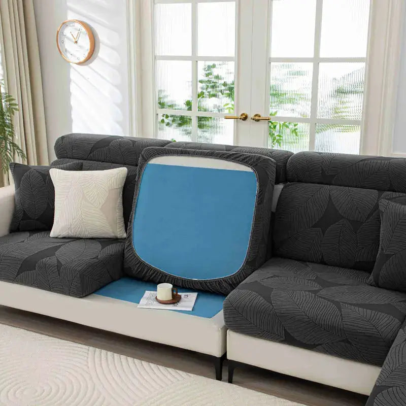 Sofa cushion cover, thick plush, elastic and removable; blue center with gray border on a dark gray sectional.