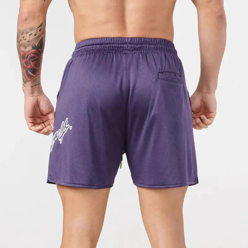 Trend men's mesh beach swim shorts in purple with elastic waist, back pocket, Simples Market logo on left leg.