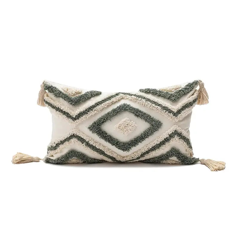 Pillow cover with green tufted diamond pattern on cream background and tassel trim, Simples Market