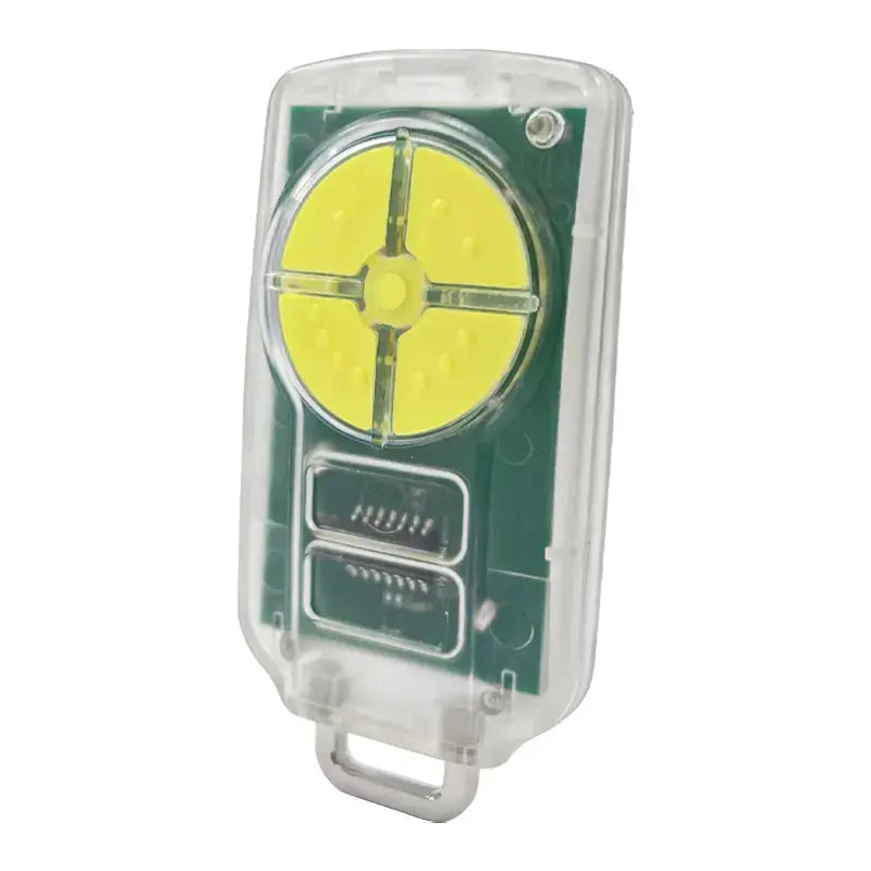 Universal garage door remote control in transparent case with yellow circular dial.