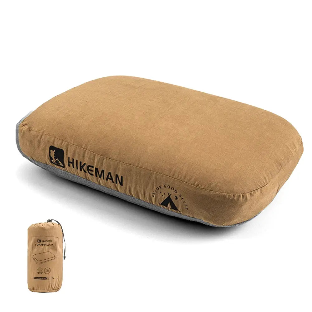Hikeman memory foam pillow for camping and travel, tan, soft slow-rebound neck support; includes carry bag.