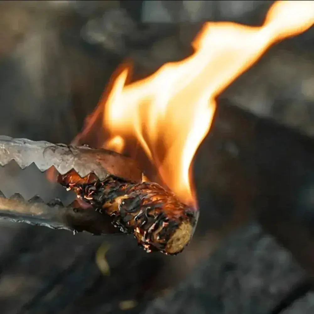 Simples Market natural wax wood fire starter sticks, glowing with flame